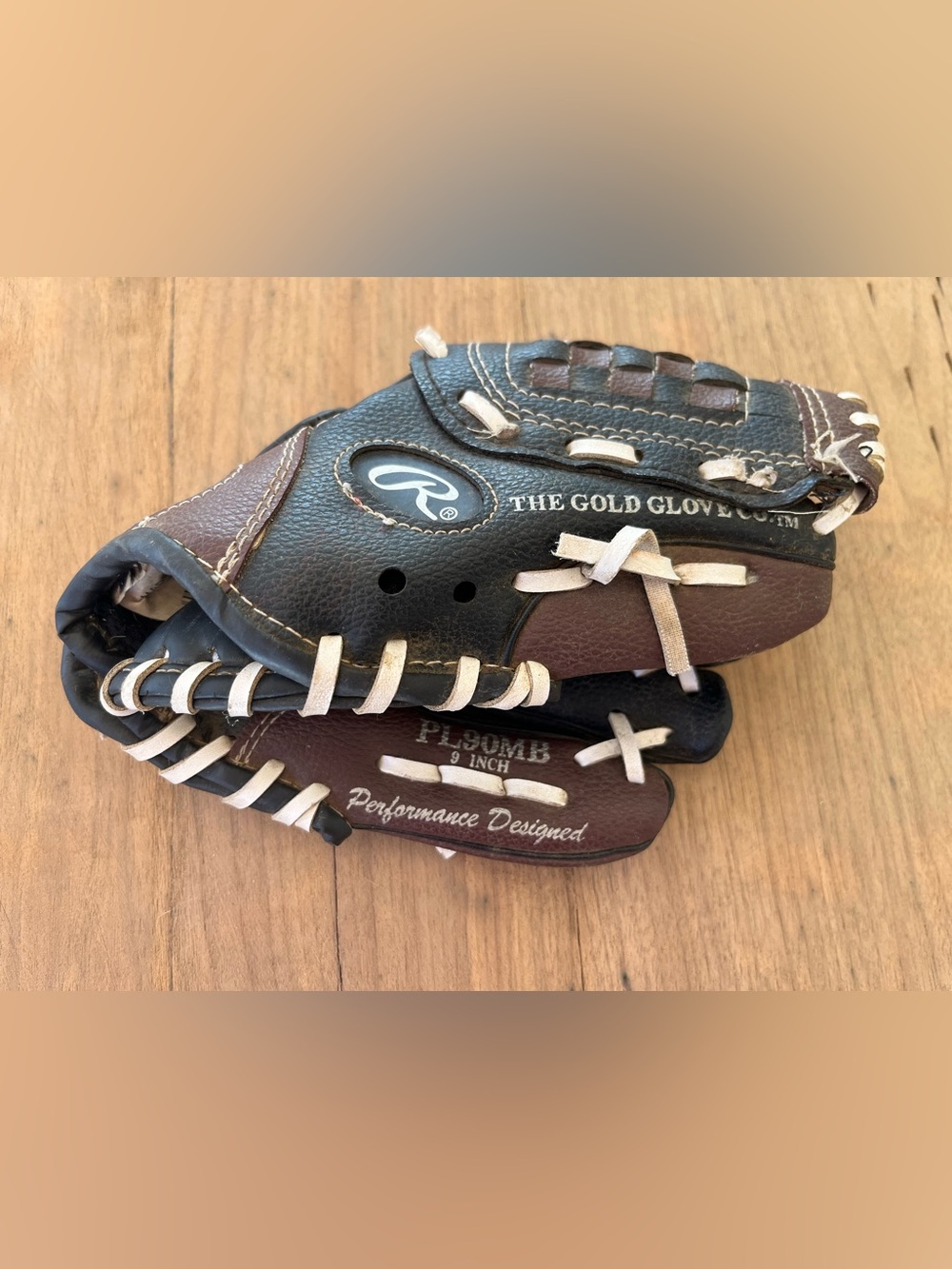 Rawlings Black and Brown Youth Baseball Glove with White Lacing